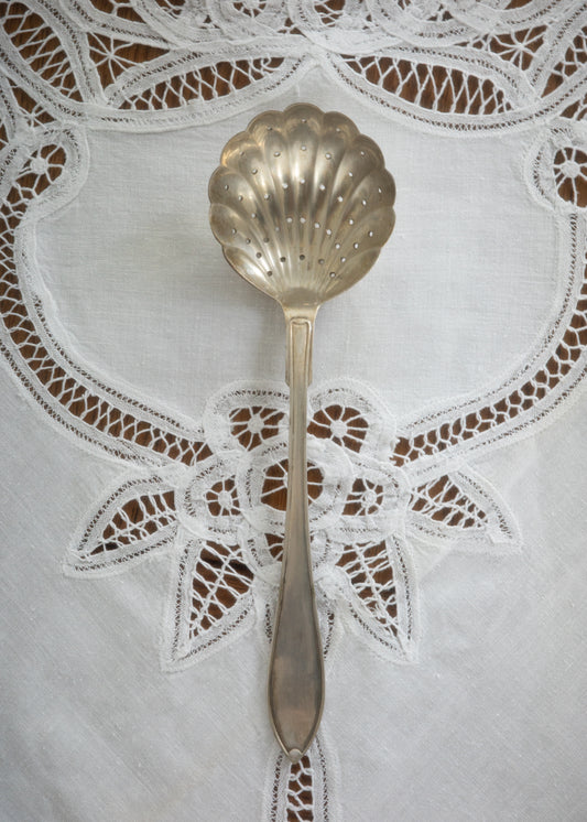 Vintage silver shell spoon