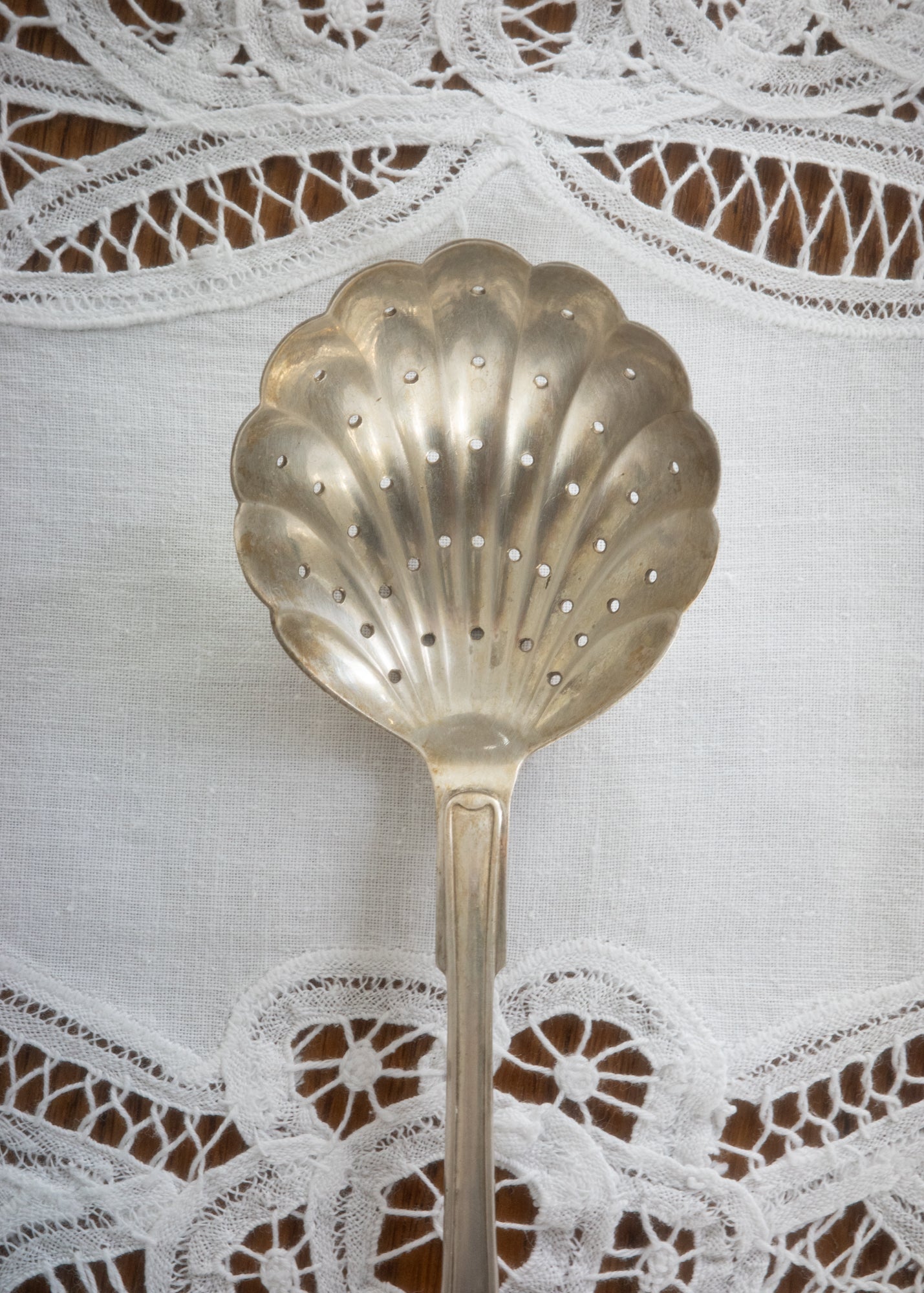 Vintage silver shell spoon
